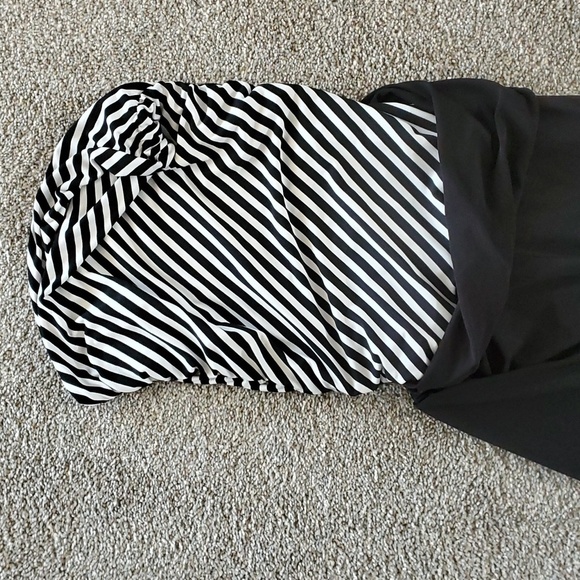 Haulter jumpsuits. Black and white striped top. Black bottom Wide leg. By Lepis - Picture 4 of 8